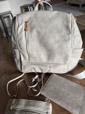 Women's Convertible Backpack set. Crossbody purse and wallet included